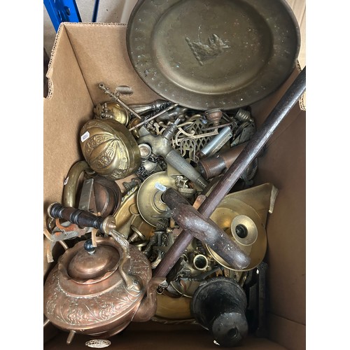 35 - Mixed collection of antique brass, copper wares to include an armorial brass charger decorated with ... 