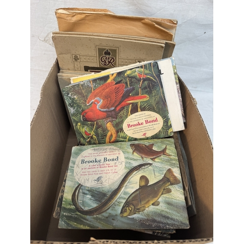 31 - Collection of cigarette cards and other collectable magazines