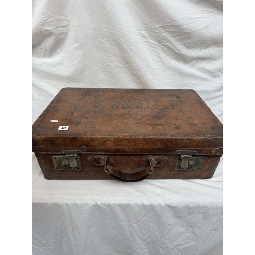 2 - Large Edwardian stitched leather bound travel case, initialised F.W.H