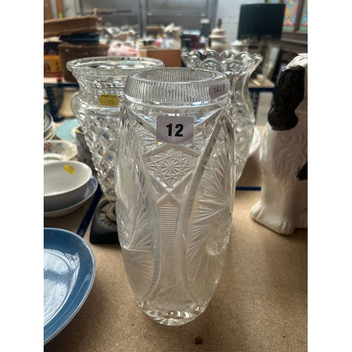 12 - Three various heavy clear cut glass vases, 31cm high maximum (3)