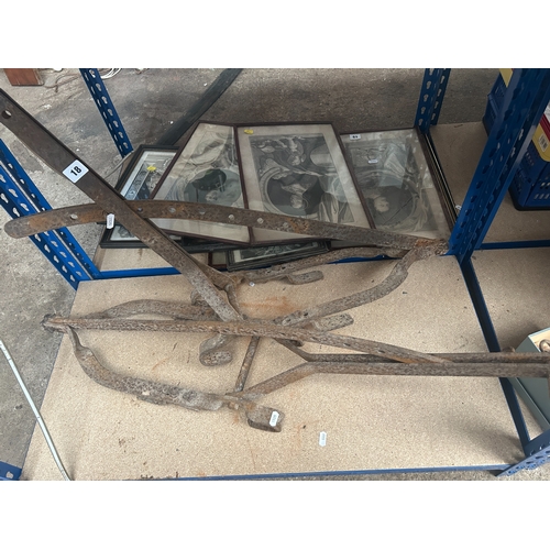 18 - Two old country iron work roofing cradles