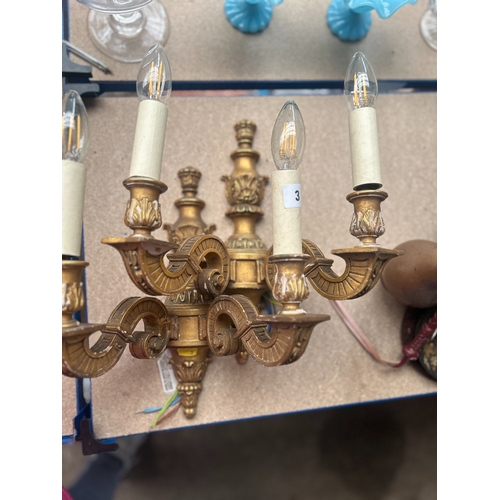 3 - Pair of antique carved and gilt wood twin-branch wall lights, 25cm high