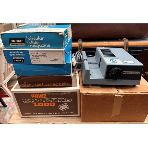 30 - Prinz Concord 1000 projector, in original box, together with a collection of boxed slide magazines a... 