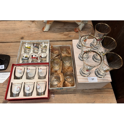 37 - Four sets of vintage drinking glasses to include cockerel and classic car examples, all held in orig... 
