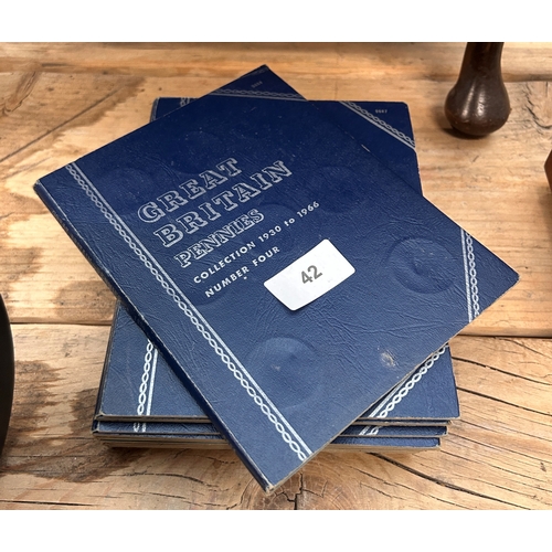 42 - Large assortment of vintage coins held across eight booklets, to include pennies and threepence bras... 