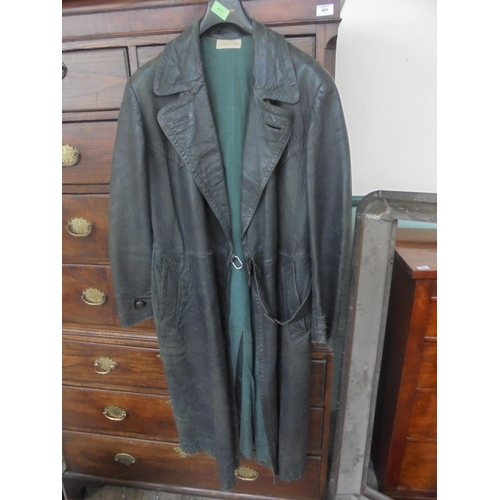 419 - A superb item being a German/Austrian full length leather trench coat in dark green in generally v.g... 