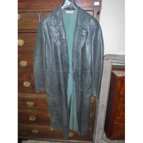 419 - A superb item being a German/Austrian full length leather trench coat in dark green in generally v.g... 