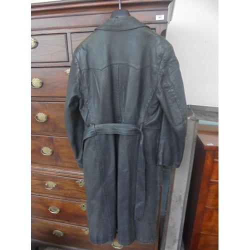 419 - A superb item being a German/Austrian full length leather trench coat in dark green in generally v.g... 