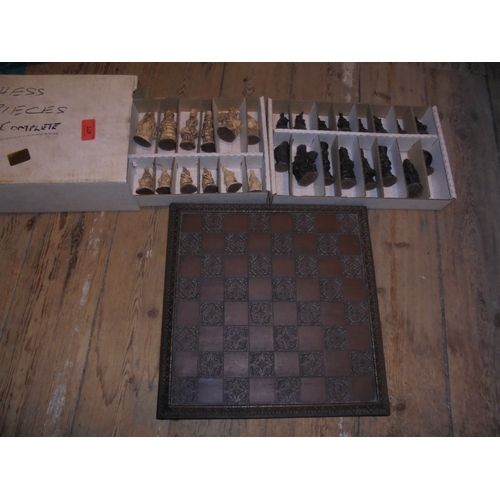 477 - Box of wooden Chess pieces being animals, together with chessboard