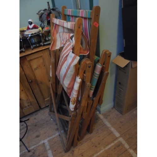 484 - Pair of wooden and canvas steamer/deckchairs for recovering