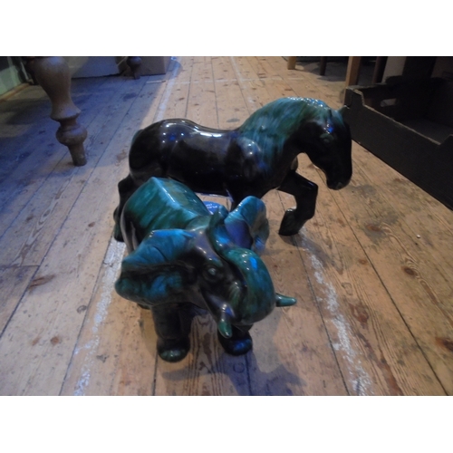 488 - 2 large ceramic figures, one of Shire Horse, 1 of an Elephant, green and brown