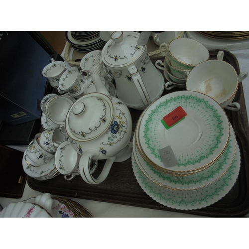 66 - 2 coffee pots, cups and saucers in ceramic ware together with selection of plates and cups of cerami... 