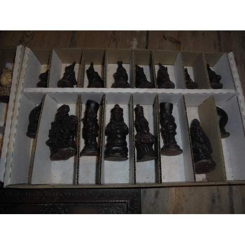 477 - Box of wooden Chess pieces being animals, together with chessboard