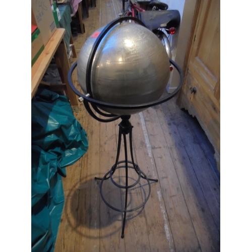 480 - Large floor standing modern revolving world globe of metal design