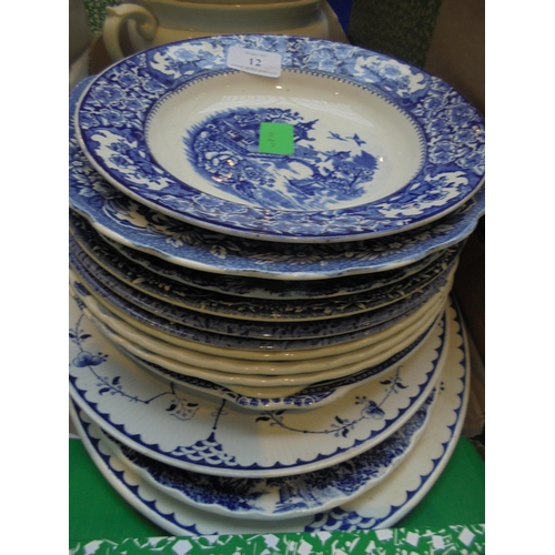 12 - Collection of blue and white ceramic bowls, plates and serving plates