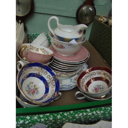 147 - Mixed lot of tea cups, saucers, milk sugar and sugar bowl