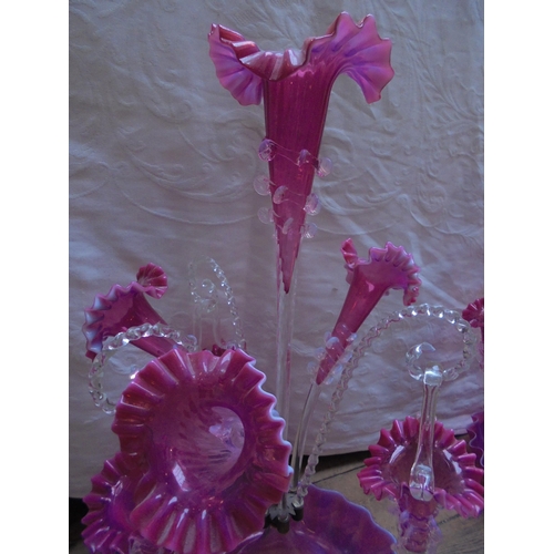 232 - Superb epergne in cranberry glass of large proportions with central base, large raised centre stem, ... 