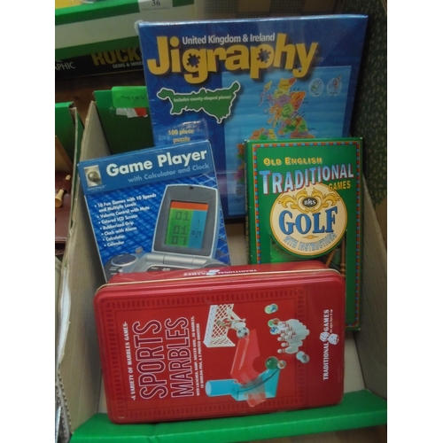 37 - Collection of small games, jigsaws, traditional content being sports, marbles and traditional golf g... 