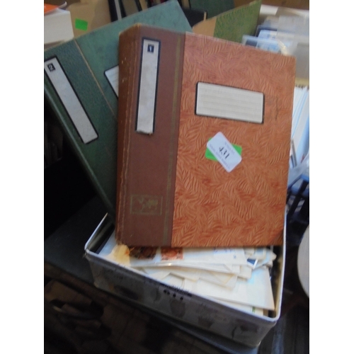 431 - Two old vintage stamp albums with a variety of foreign stamps and tin containing a variety of Britis... 