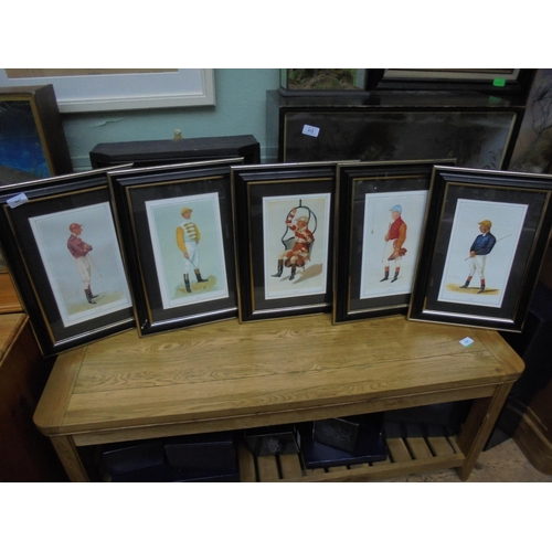 447 - Set of 5 prints of various Jockeys in racing clothing, attractive black and gold frames