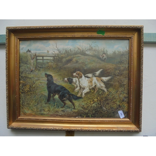 490 - Print in gold frame of hunting scene showing Setters chasing prey