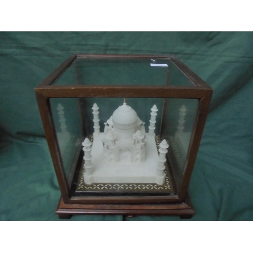 513 - Attractive miniature marble model of Taj Mahal on painted metal base within a wooden and glass cabin... 