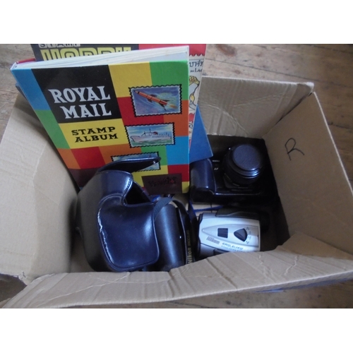 567 - A Minolta SLR camera, pair of eagle view binoculars by Nikon, a pack of strirrup cups and two stamp ... 