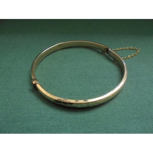 628 - Vintage bangle marked 9 carat.