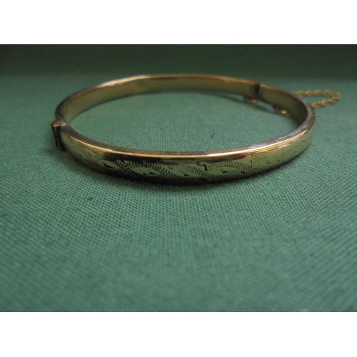 628 - Vintage bangle marked 9 carat.