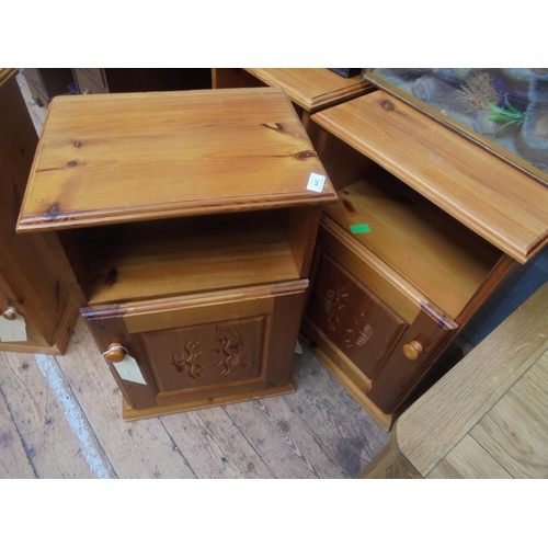 641 - Pair of pine bedside units with carved frontage