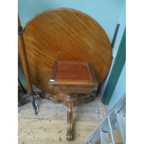 647 - Mahogany circular dining table on central tripod base in two separate pieces