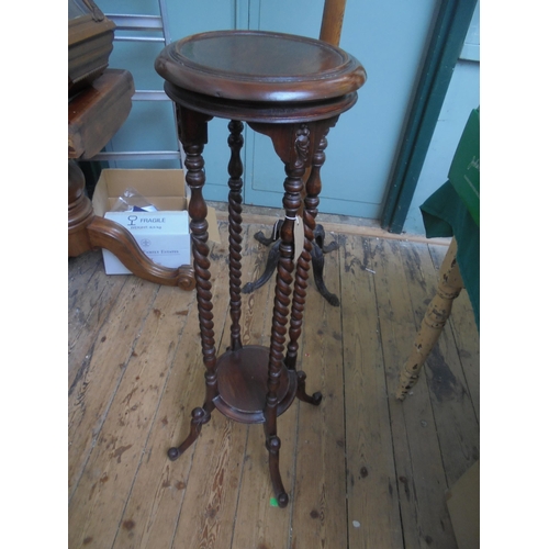 649 - 2 tier jardiniere stand on barley twist uprights and decorative legs in oak