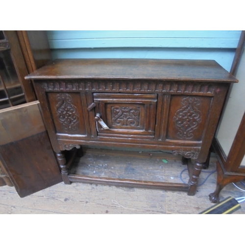 652 - Dark oak |Elizabethan styled pot cupboard with central door