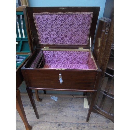 654 - Unusual mahogany sewing table with fabric lined interior and fitted to one side with cotton drawers ... 