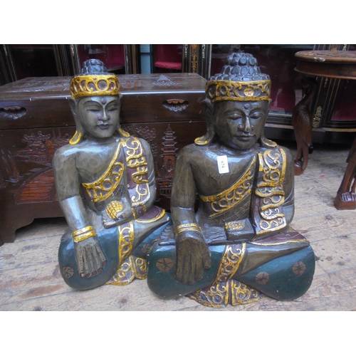 674 - Pair of modern carved Far Eastern temple statues.