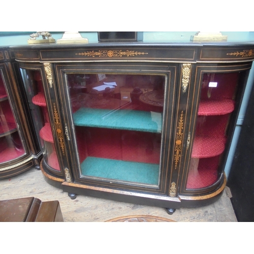 676 - Fine ebonised credenza with inlaid woods and brass features, central glass display with front openin... 