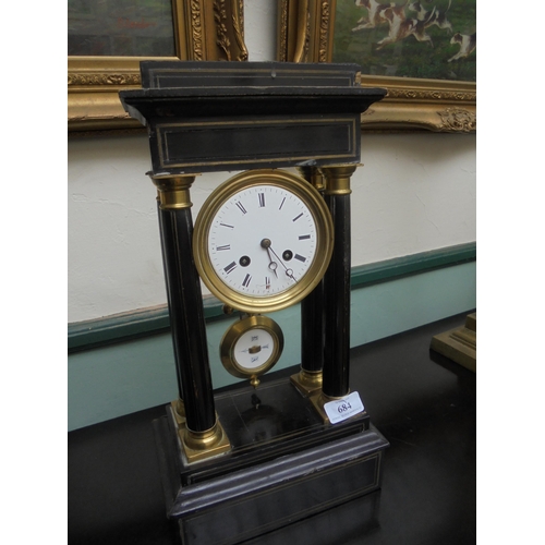 684 - Ebonised portico clock with enamel dial and central pendulum, pillar featured.