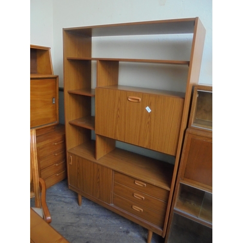 710 - 1970's display unit with sliding door cupboard and drawers to base, drop down leaf and open display ... 