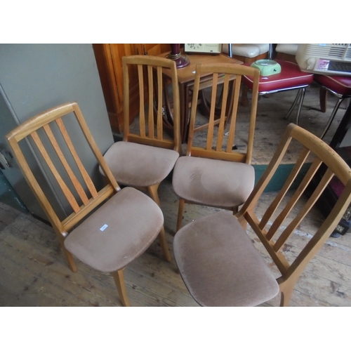 713 - Set of four 1970's Ercol  style chairs with original fabric seating.