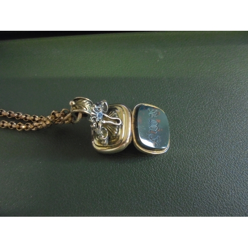 629 - Victorian longard plus secret compartment gold fob.