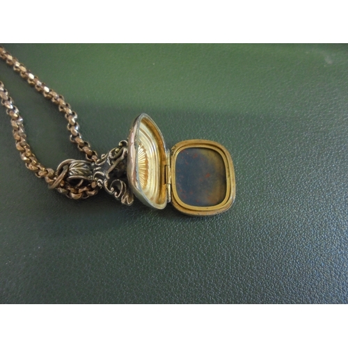 629 - Victorian longard plus secret compartment gold fob.