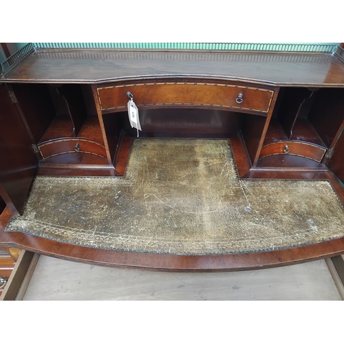 656 - Neat mahogany leather topped bonheur-de-jour with central drawer and 2 cupboards and drawer over, me... 