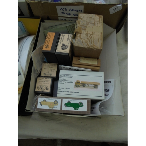 228 - Box of model makers accessories, some white metal, mainly military vehicles