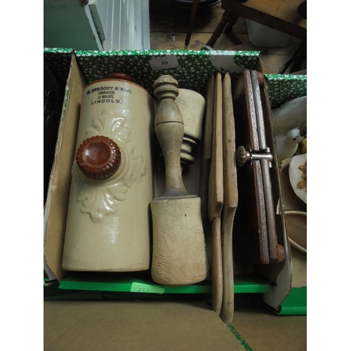 30 - Box of kitchen treen including potato mashers, tie press and hot water bottle marked W. Gregory, Lin... 