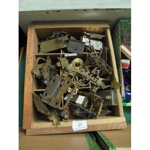 37 - Useful lot of old brass handles, locks and other items for renovation purposes