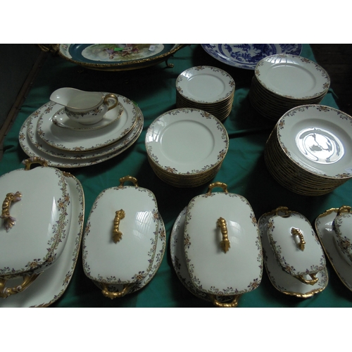 382 - Superb 58 piece dinner service marked Limoges J.Pouyat with gilding including 3 different sized plat... 