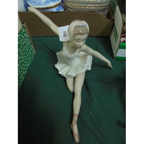 398 - Porcelain figurine of a ballerina with arms out