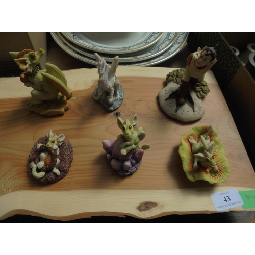 43 - Highly collectable set of 15 Enchantica figures on a wooden board