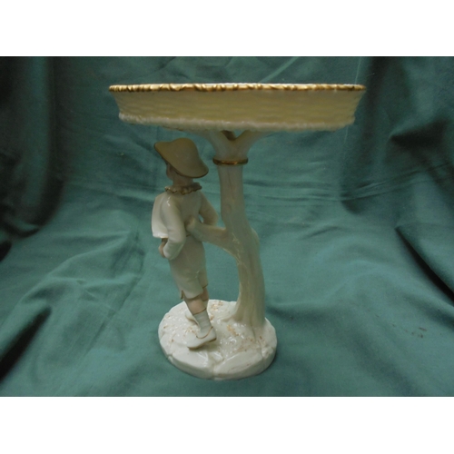 442 - Worcester lustre figure of boy with sweet dish above on tree shaped stand