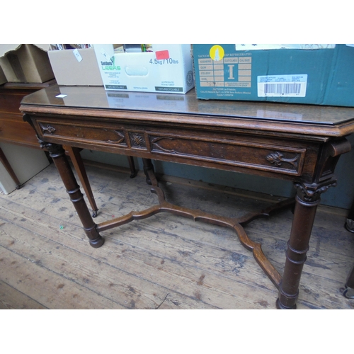 572 - Unusual oak gothic style table on unusual legs and stretchers, split to top but with glass surface c... 